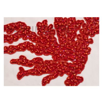 Angel Embroidery - clear sequins at the base and beads of varying shapes and sizes on top