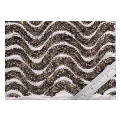 Arabella Snaking Embroidery - embellished with beads gives a serpent-like appearance