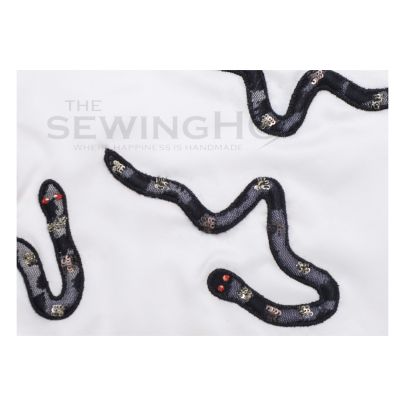 Amos Snake Embroidery - tulle lace fabric is appliquéd onto the base fabric