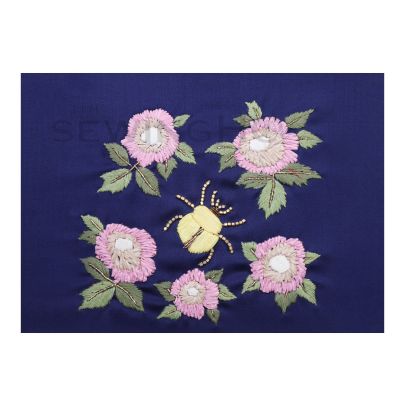 Ashton Bug Embroidery - characterised by its unique materials, natural hues, and dynamic appearance