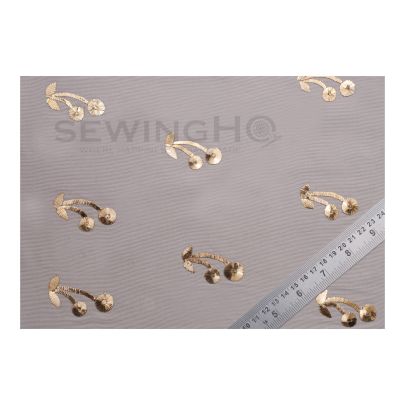 Alexia Embroidery - metal wires are used to create this gold cherry embellishment