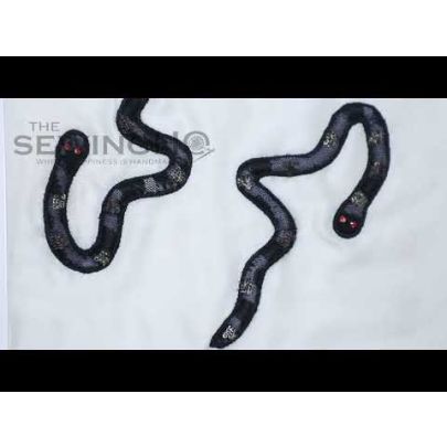 Amos Snake Embroidery - tulle lace fabric is appliquéd onto the base fabric